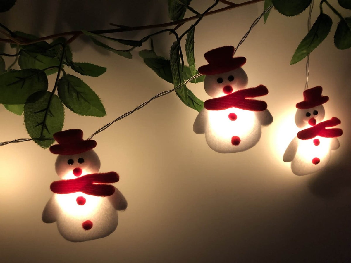 sneeuwman kerstdecoratie als sfeervolle lichtslinger