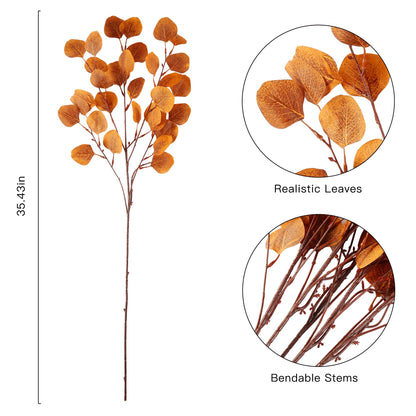 Oranje kunstmatige eucalyptusbladeren als sfeervolle herfstdecoratie