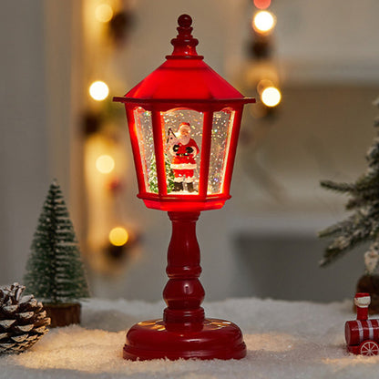 Kerstlamp met huisvormig ontwerp op een tafel