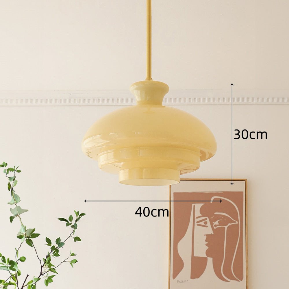 stijlvolle bauhaus hanglamp met elegant roomgeel glas