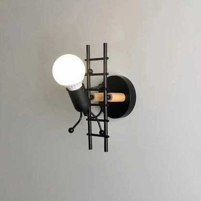 Moderne zwarte wandlamp naast een kinderbed in de kinderkamer