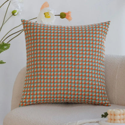 Vierkante decoratieve kussenhoes met geometrische vlakken en kleurcontrast