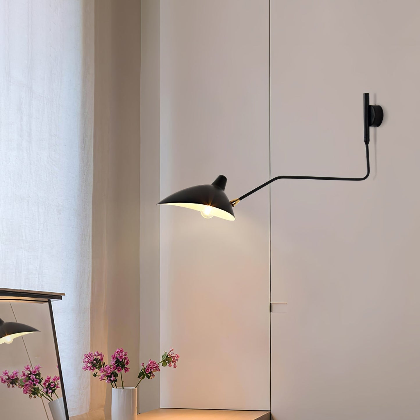 stijlvolle wandlamp van serge mouille