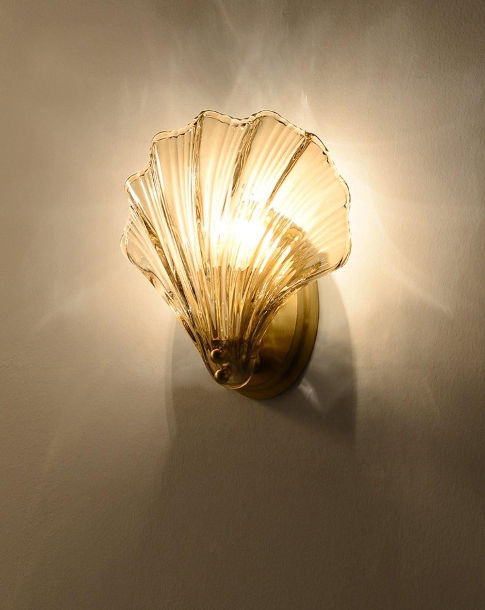 elegante wandlamp in schelpdesign