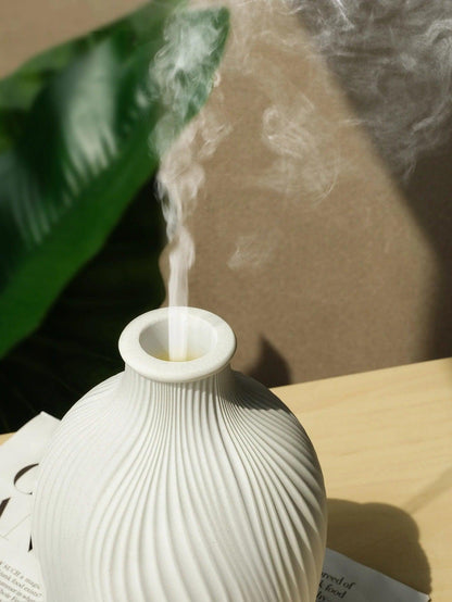 Aroma diffuser verspreidt een fijne nevel in huis